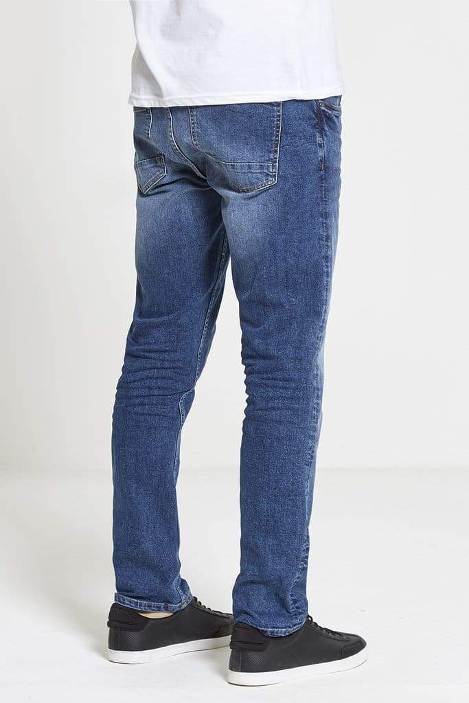 Maverick Slim Straight Stretch Jeans In Mid Wash - Jeans